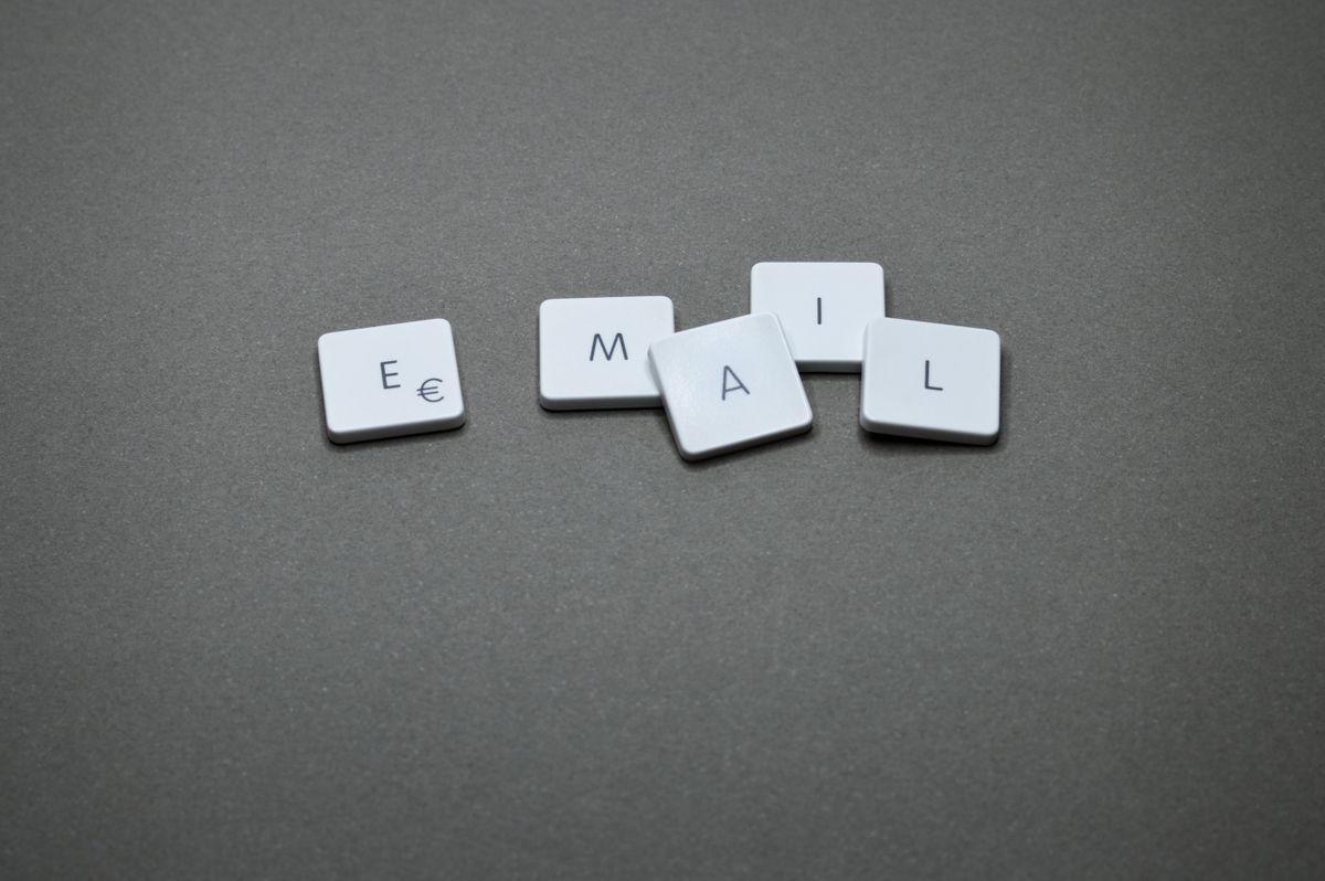 Wooden letter tiles spelling the word email