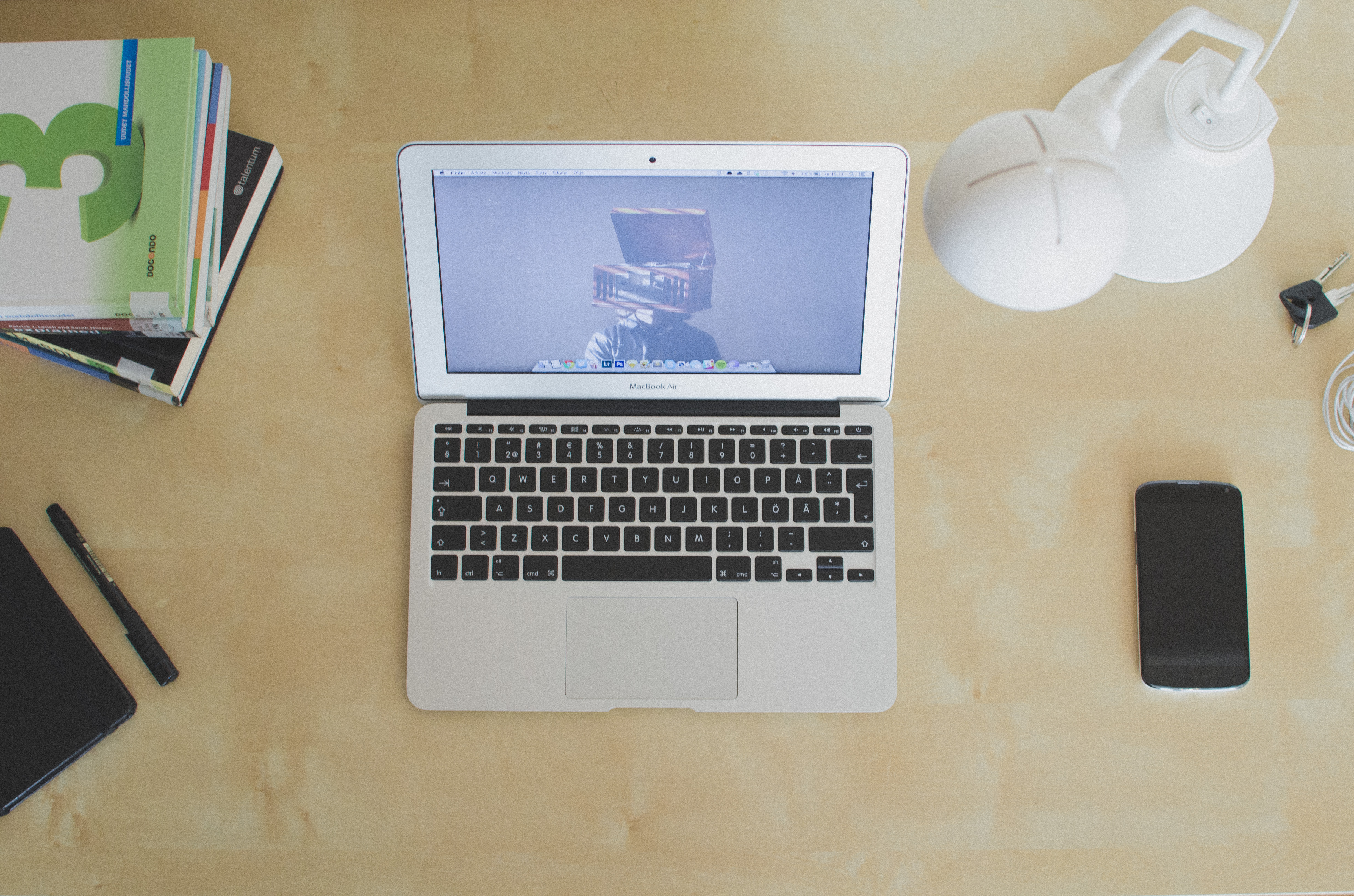 Laptop on a desk, used for writing website content.